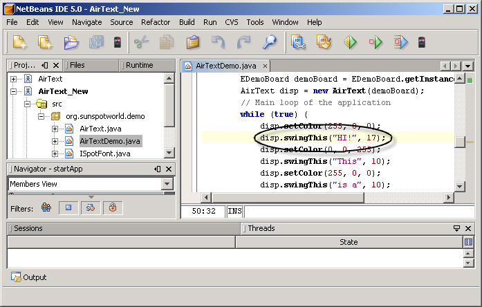A NetBeans screenshot. The AirTextDemo.java file is open in the editor window and the window is scrolled a little bit more than half way through the file.  The source shown in the screenshot reads, in part, 'while (true) { disp.setColor(255,0,0); disp.swingThis('HI!', 17);'  The statement beginning 'disp.swingthis' is circled in the figure.